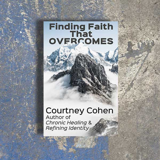 Book cover of 'Finding Faith That Overcomes' by Courtney Cohen with a mountainous landscape on a textured background