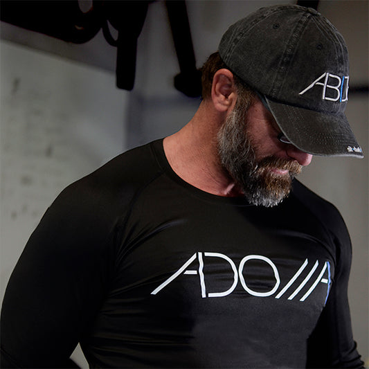 A dry-fit long sleeve shirt with the word "Adonai," a Hebrew name for God displayed. This is Christian apparel.