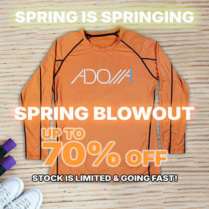 Orange athletic shirt with 'Adonai' branding on a wooden surface, promotional text overlay.