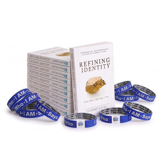 Book titled 'Refining Identity' with wristbands on a white background
