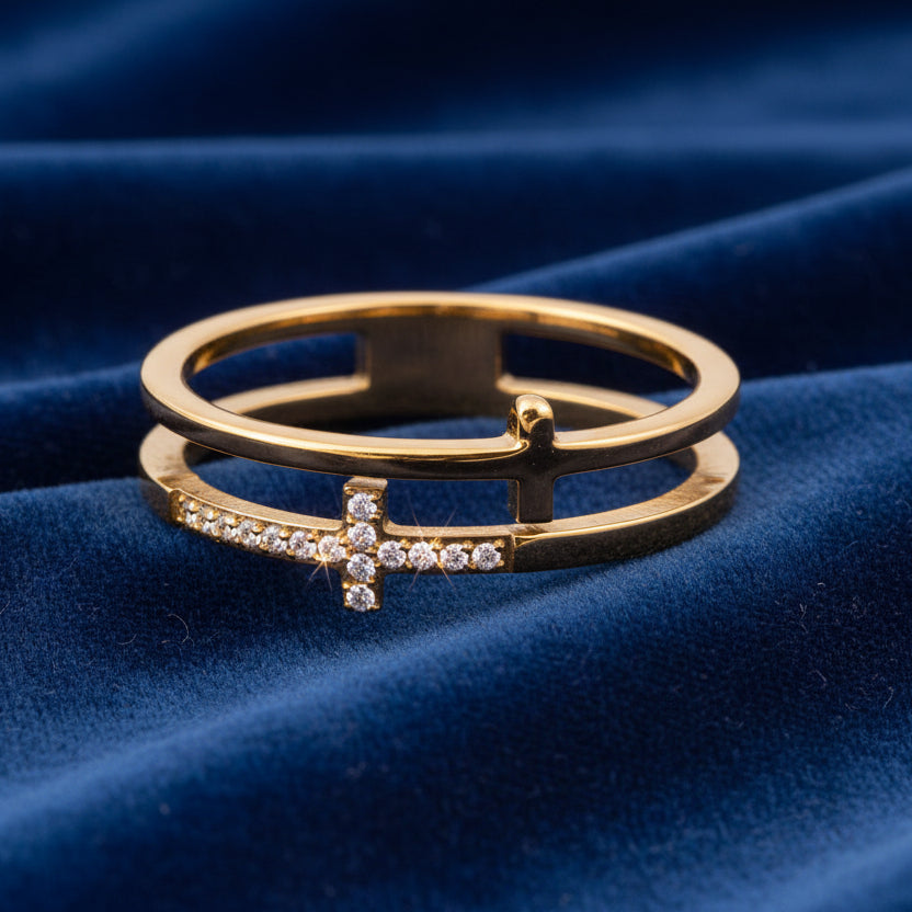 Gold ring with diamond accents on a blue velvet background