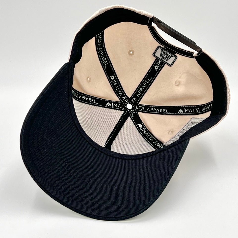 Black cap with beige interior Malta Apparel Tape on a white background