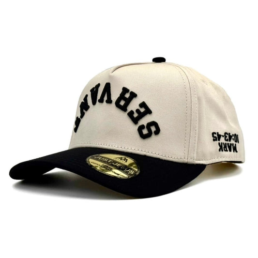 Two-tone cap with black and beige color scheme with Servant and Mark 10:43-45 Upside down on a white background